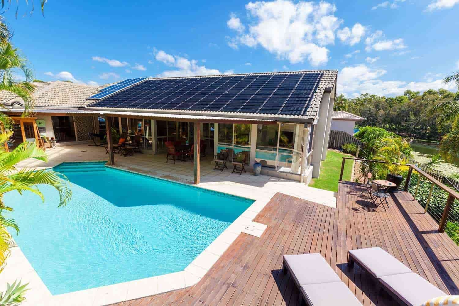 A House with Solar Roof & a swimming pool on it