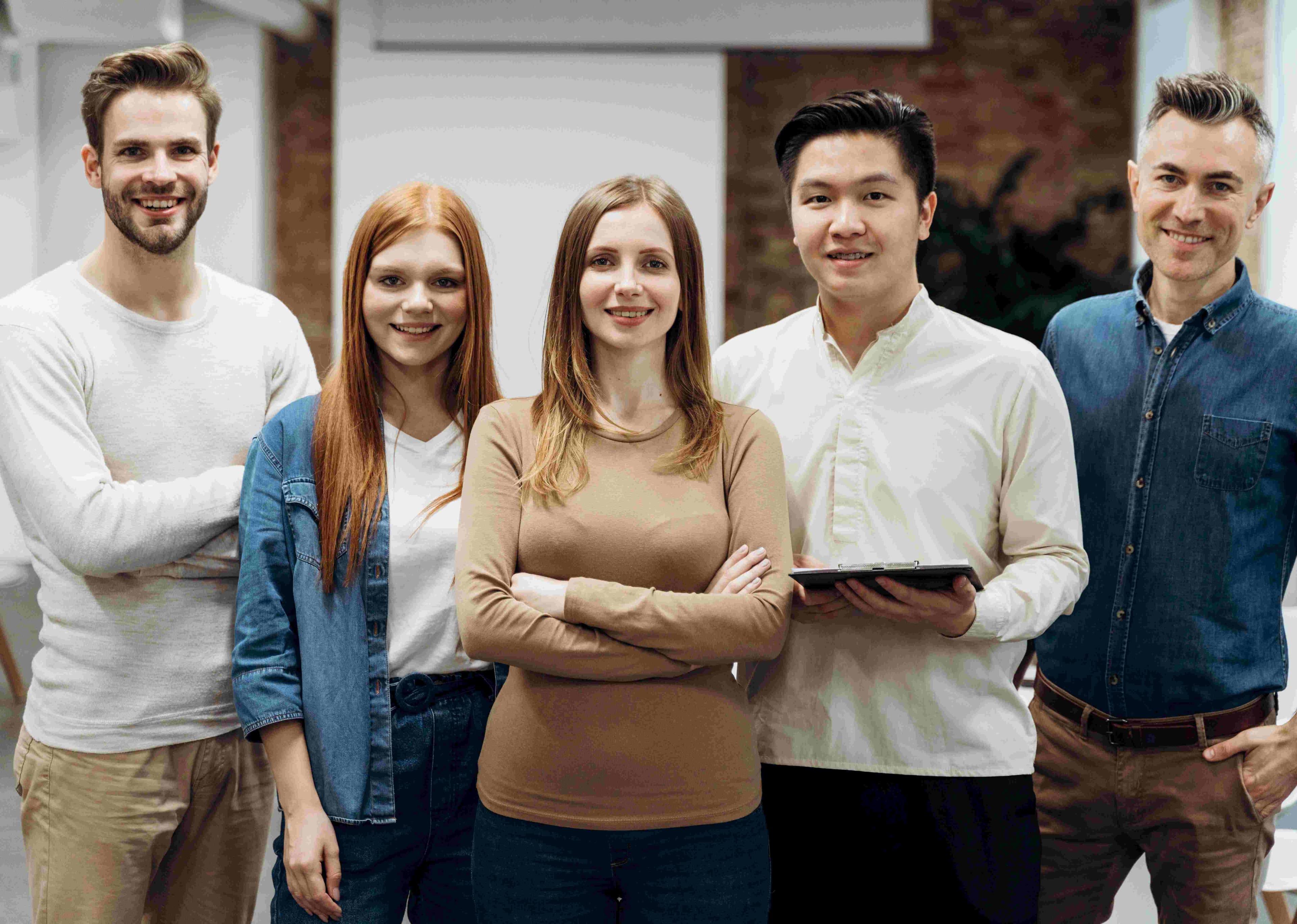 Tre employees standing to show there respect to the company image